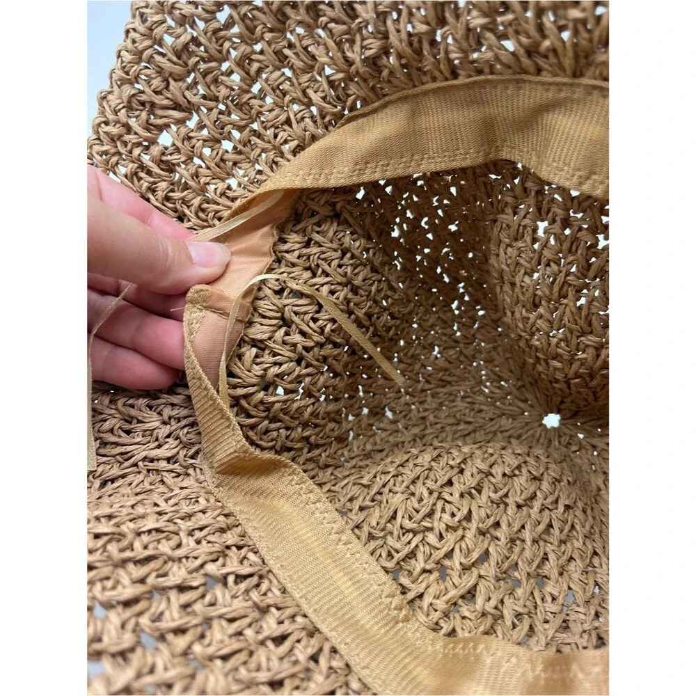 Women’s crocheted straw cloche hat with a bowknot